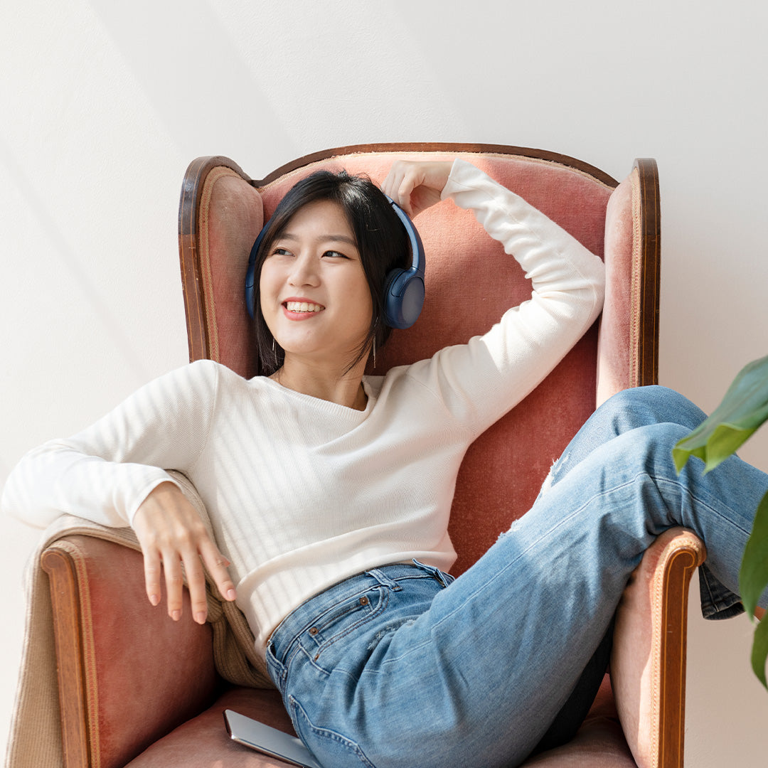 A person relaxing in an armchair