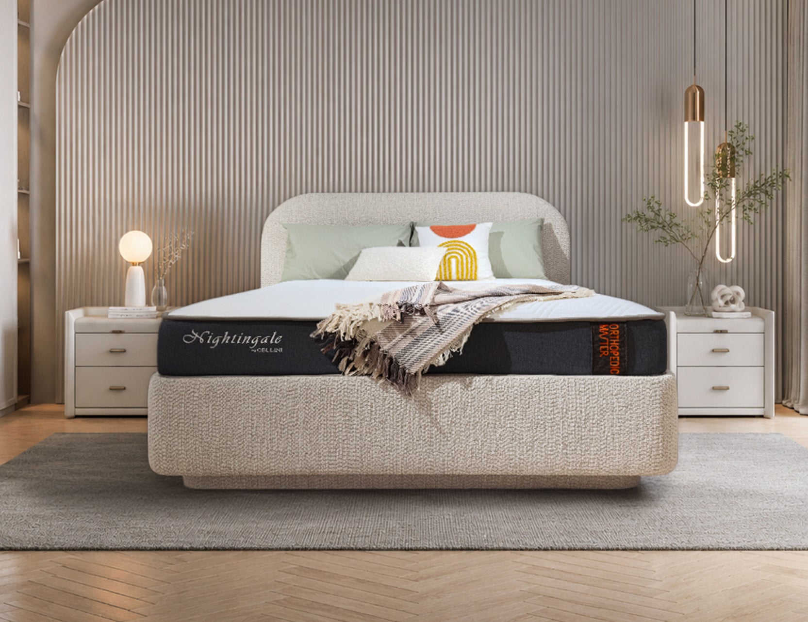 Cellini Nightingale orthopedic mattress on upholstered bed in cozy neutral bedroom with beige headboard, layered pillows and warm ambient lighting