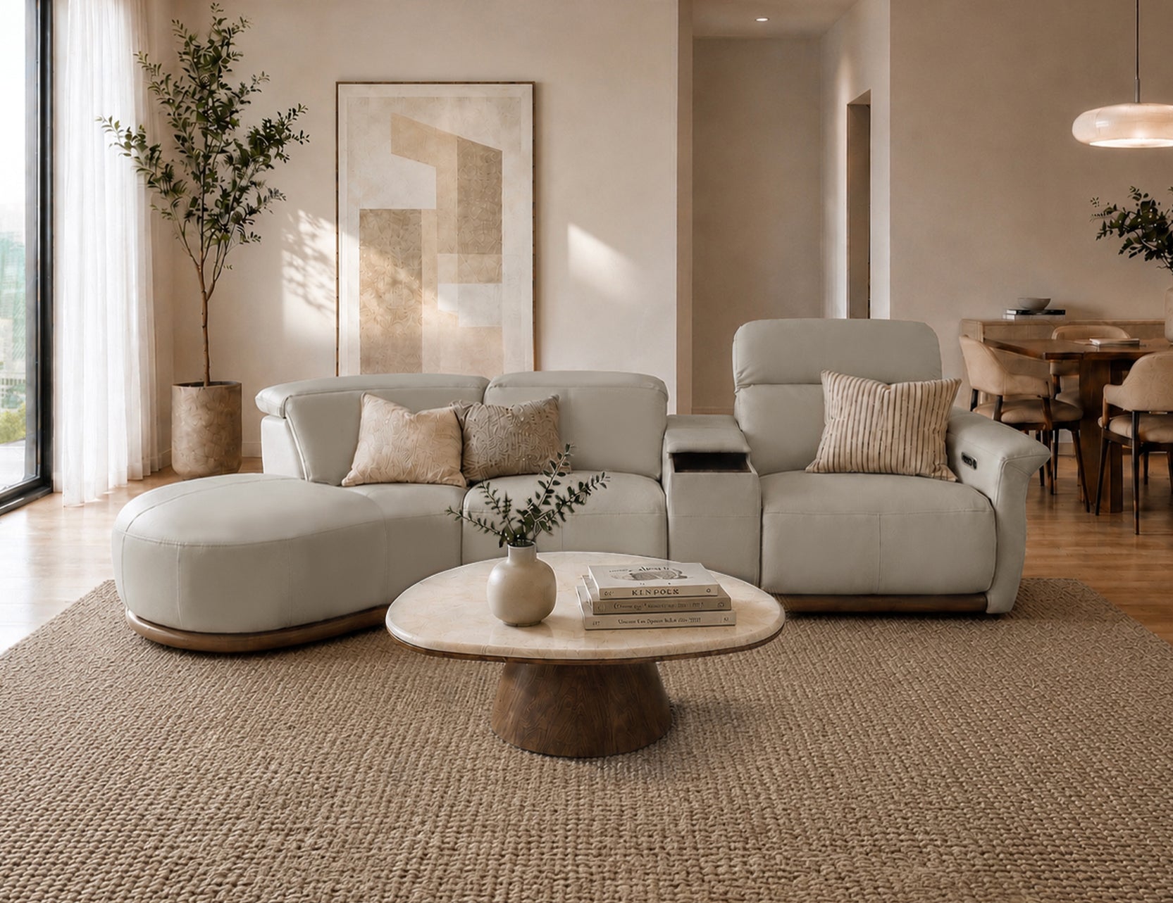 Cellini cream leather sectional sofa with curved ottoman and power recliner in a warm minimalist living room
